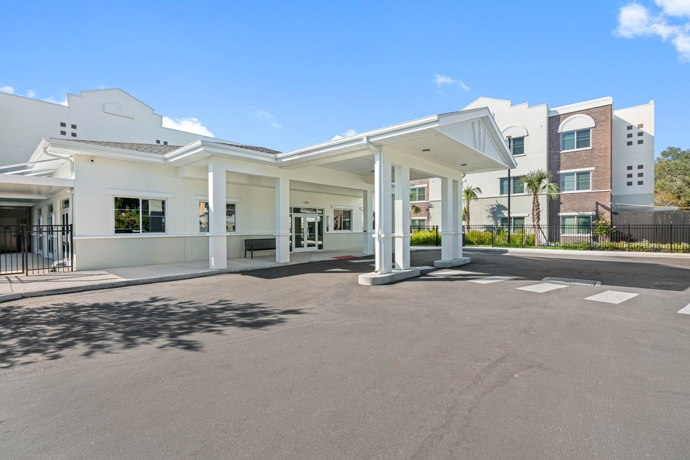 Portico of The Legacy at Jordan Park senior midrise building.