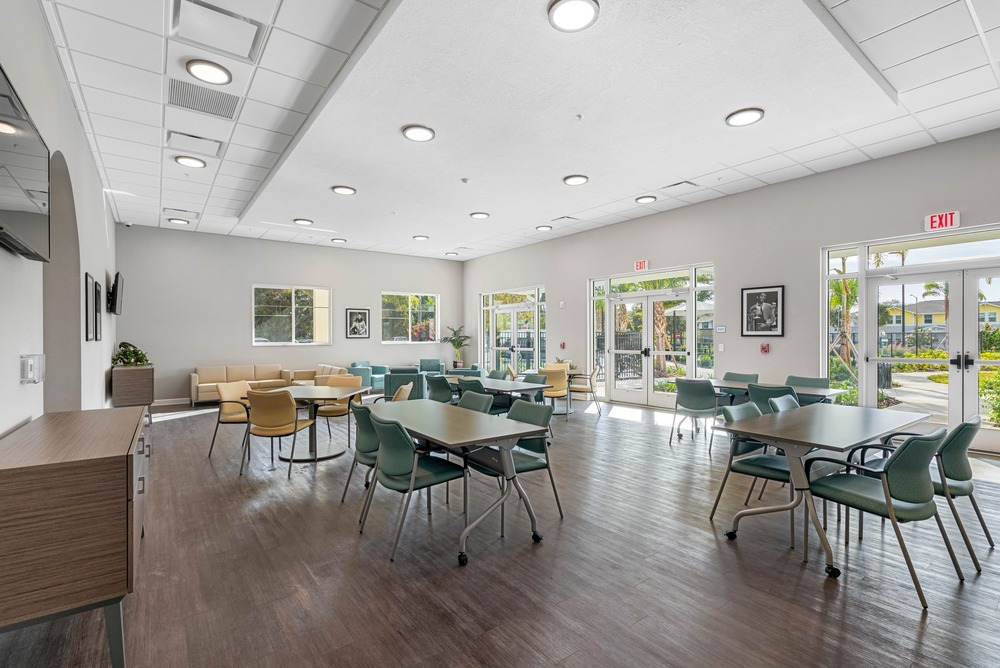 Downstairs community room inside The Legacy at Jordan Park senior midrise building.