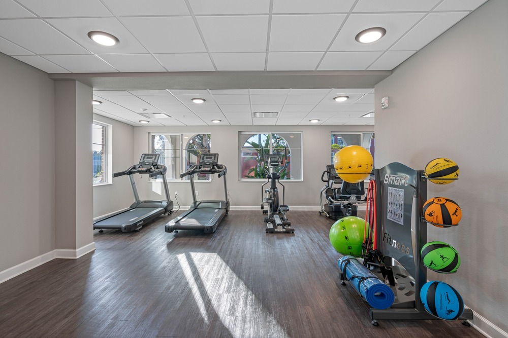 Gym inside The Legacy at Jordan Park senior midrise building.