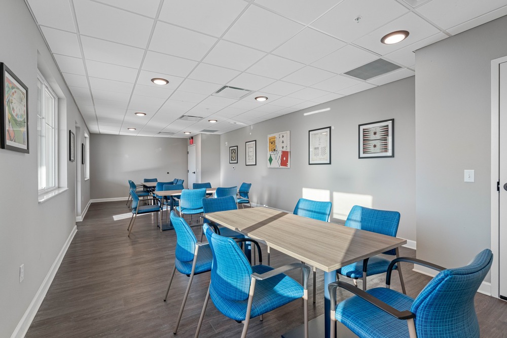 Game room inside The Legacy at Jordan Park senior midrise building.