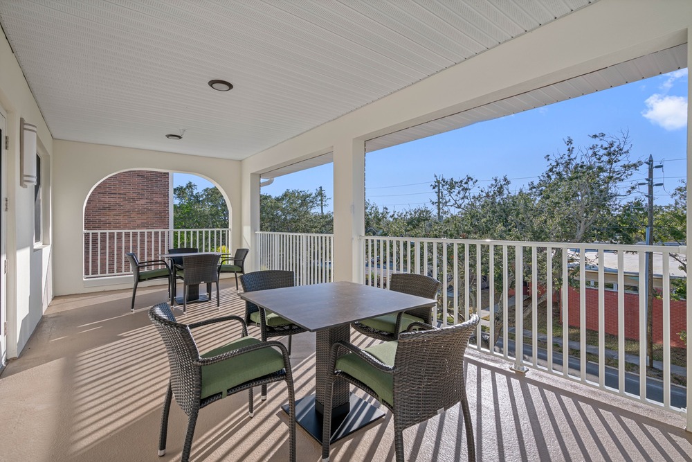 Community balcony in The Legacy at Jordan Park senior midrise building.