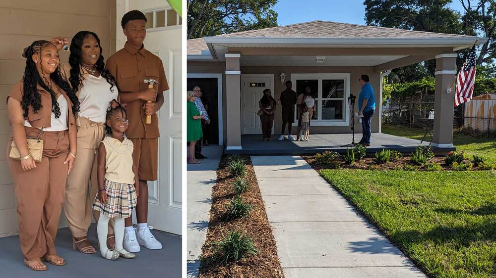 Family Self-Sufficiency (FSS) Program participant Amber and her family in front of their new home.