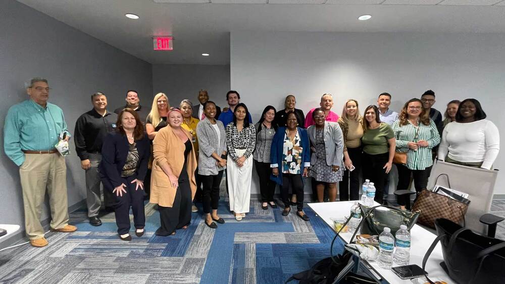 Group of people at Landlord Engagement Event in Tampa on March 24, 2025.