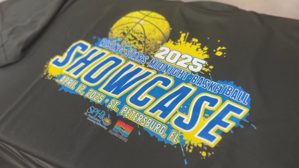 T-shirt with Basketball Tournament logo.