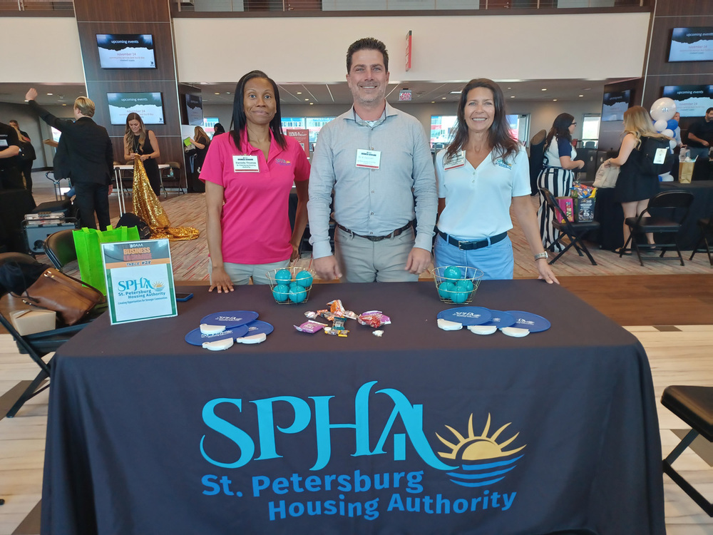Three St. Petersburg Housing Authority (SPHA) team members participating in the Bay Area Apartment Association (BAAA) Business Exchange event.