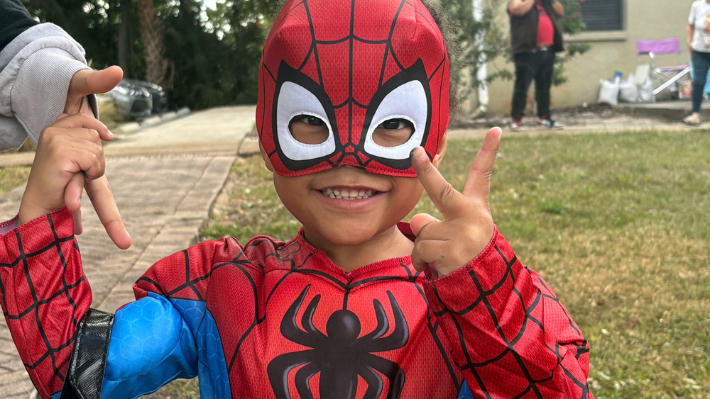 A child dressed as Spider-Man at Trunk or Treat event.