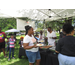 Line of guests getting food in Crescent Lake Park.