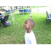 Boy with face painted.