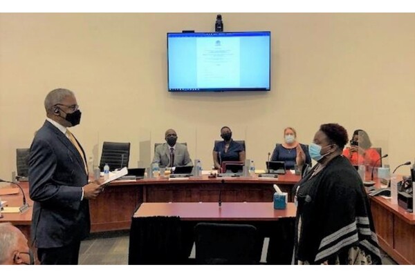 Michael Lundy, SPHA President and CEO, swears in Kimberly Brown-Williams to the SPHA Board of Commissioners.