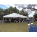People seated under a tent in Jordan Park.