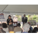 Jerri Evans at podium in Jordan Park.