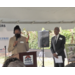Lisa Wheeler at podium in Jordan Park.