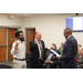 Meiko Seymour and Derek Keys being sworn in as SPHA Commissioners by Mr. Michael Lundy.