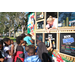 Children getting frozen treats at Very Merry Holiday Party at Jordan Park .