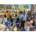 Children and families searching for eggs at Jordan Park Easter Egg Hunt.