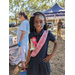 Child smiling with her face painted at Jordan Park Easter Egg Hunt.