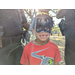 Child smiling with face painted at Jordan Park Easter Egg Hunt.