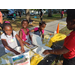 Kids playing at table in Joran Park.