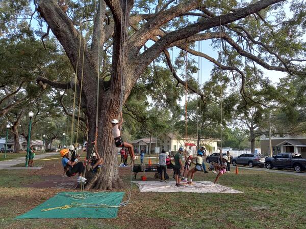 Group of people at community event in Jordan Park.