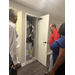 Man opening door inside The Legacy at Jordan Park.