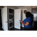 SPHA President and CEO Michael Lundy and Pinellas County Commissioner Rene Flowers looking at a washing machine and dryer machine inside The Legacy at Jordan Park.