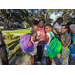 Kids wearing new backpacks at Jordan Park Back to School Event 2023.