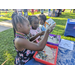 Kids playing at Tampa Bay Watch table.