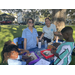 Kids at Tampa Bay Watch table at Jordan Park Back to School Event 2023.