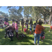 Jordan Park families in grass at Jordan Park Back to School Event 2023.