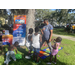 Kids playing with United Way Suncoast team member at Jordan Park Back to School Event 2023.