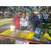 People smiling at Jordan Park Back to School Event.