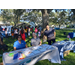 People at table at Jordan Park Back to School Event 2023.