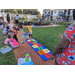 Children playing hopscotch at Disston Place Apartments Back to School Event 2023.