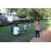 United Way Suncoast team with children playing with bubbles at Disston Place Apartments Back to School Event 2023.