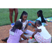Children playing outside together at Disston Place Apartments Back to School Event 2023.