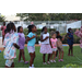 Group of children dancing outside at Disston Place Apartments Back to School Event 2023.