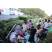 Group of children getting backpacks at Disston Place Apartments Back to School Event 2023.