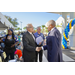 People shaking hands at The Legacy at Jordan Park Grand Opening event.