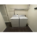 Washer and dryer in a Jordan Park Family Unit.