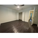 Inside bedroom with view of closet of a Jordan Park Family Unit.