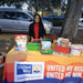 Woman smiling at United Way Suncoast table.