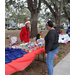 People talking to each other at Very Merry Holiday Party in Jordan Park.