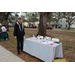 Person standing by Healthy St. Pete table at Very Merry Holiday Party in Jordan Park.