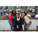 Three people at Very Merry Holiday Party 2023 in Jordan Park.