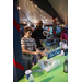 People at Snow Cone table at Very Merry Holiday Party in Jordan Park.