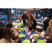 People at holiday craft table at Very Merry Holiday Party in Jordan Park.