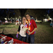 Two women smiling at Very Merry Holiday Party 2023 in Jordan Park.