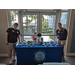 Tampa Bay Watch Discovery Center table inside The Legacy at Jordan Park building during SPHA Winter Wonderland event.