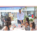 SPHA President/CEO Michael Lundy talking with family outside at The Legacy at Jordan Park during SPHA Winter Wonderland event.