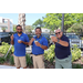 Three SPHA team members outside holding snow cones at SPHA Winter Wonderland event.